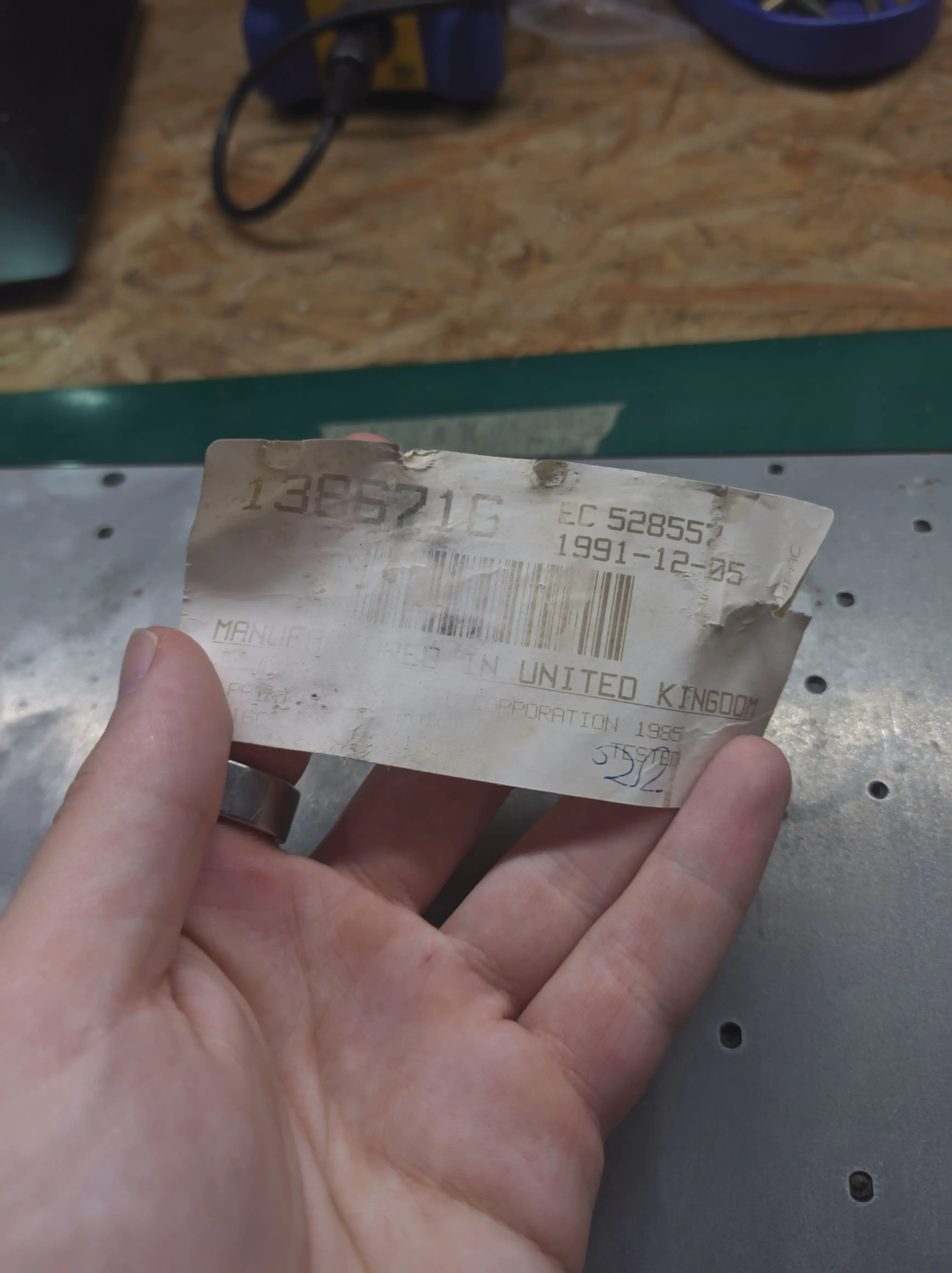 The outside sticker was damaged, so I peeled this one off with the help of a hot air station and glued it on top of the external one. Manufactured in the UK, on December 5th 1991.